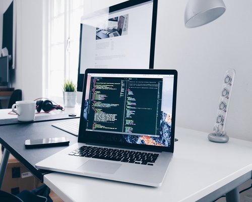 Ergonomic home office setup with a supportive chair and proper monitor height